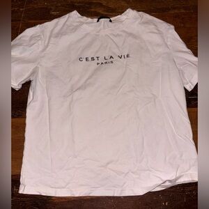 White paris destination t shirt a little cropped but not super short